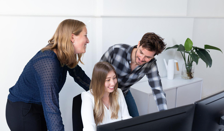 Team works together in the DERMALOG office.