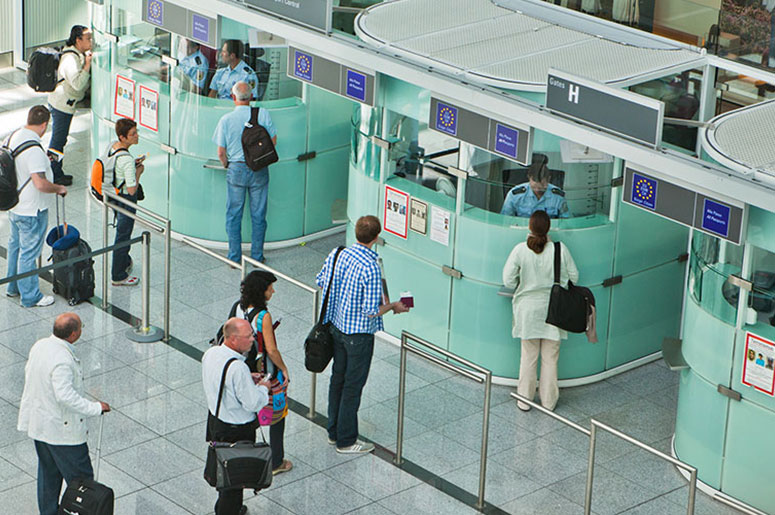 People standing in line for border control